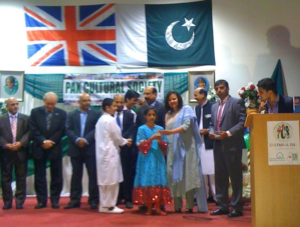 Giving prizes to kids in Walthamstow on the occassion of Pakistan's Independence Day